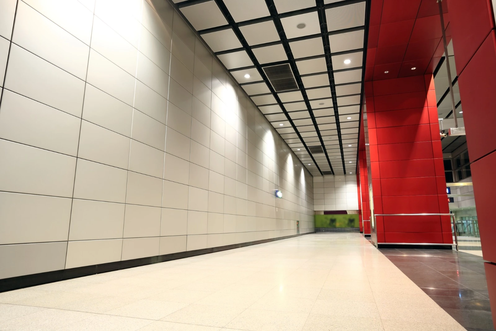 Structural beam wrapped in aluminium composite panel